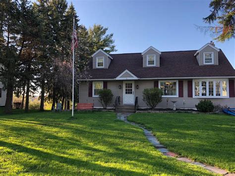 This classic home, nestled on a beautiful street, features a well-thought-out layout. . Land for sale in onondaga county
